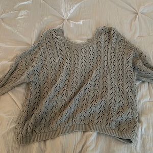 Knitted Sweater (wear a shirt underneath) with back tied in a knot